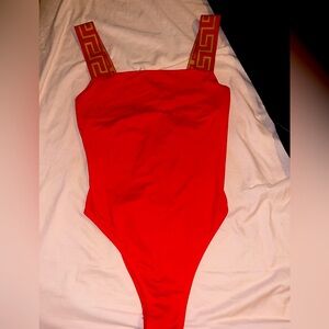 Versace Red Bodysuit One Piece with High-Cut Design